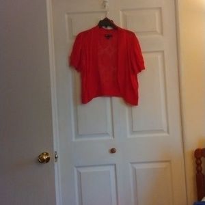 Orange Shrug by:  I.N. Studio; Size: XL